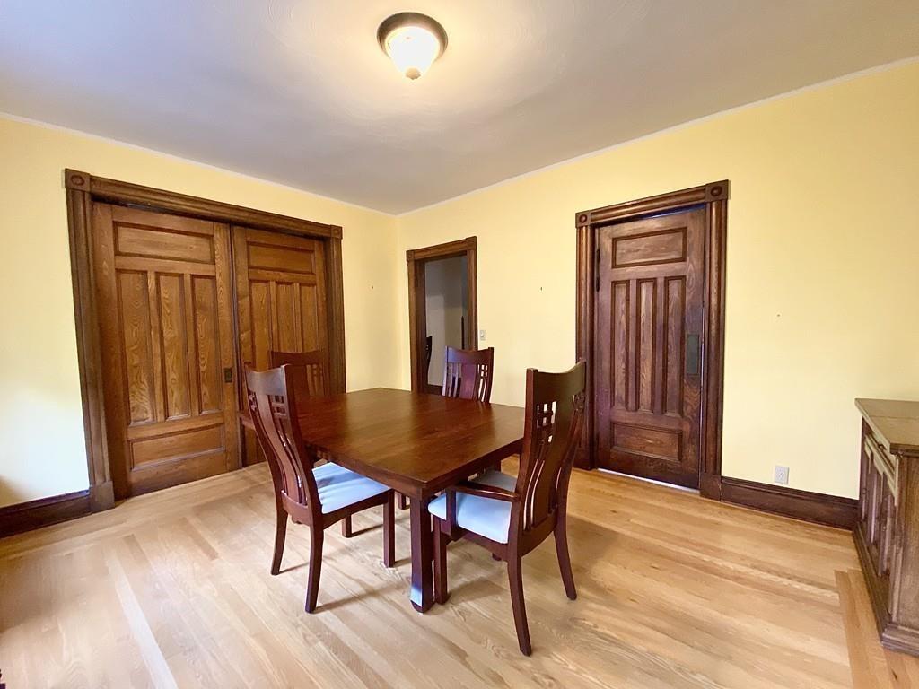 35 Washington Road Springfield, MA 01108 - Photo 11 of 42 a view of a dining room with furniture and wooden floor