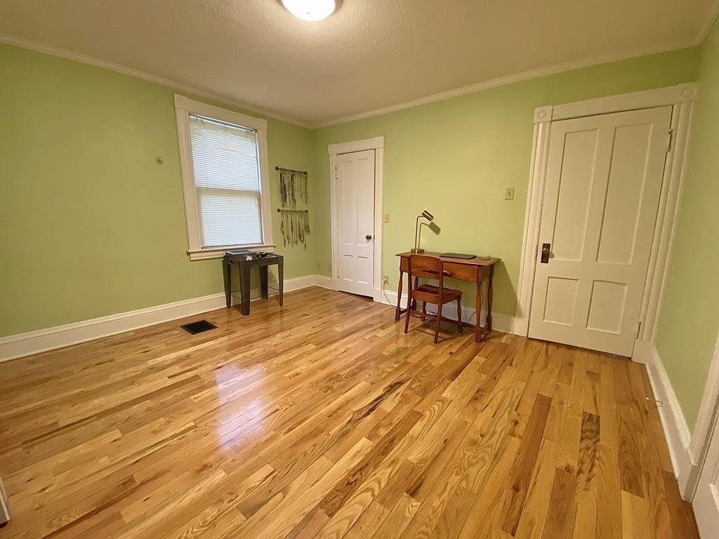 35 Washington Road Springfield, MA 01108 - Photo 31 of 42 a view of a room with wooden floor and furniture