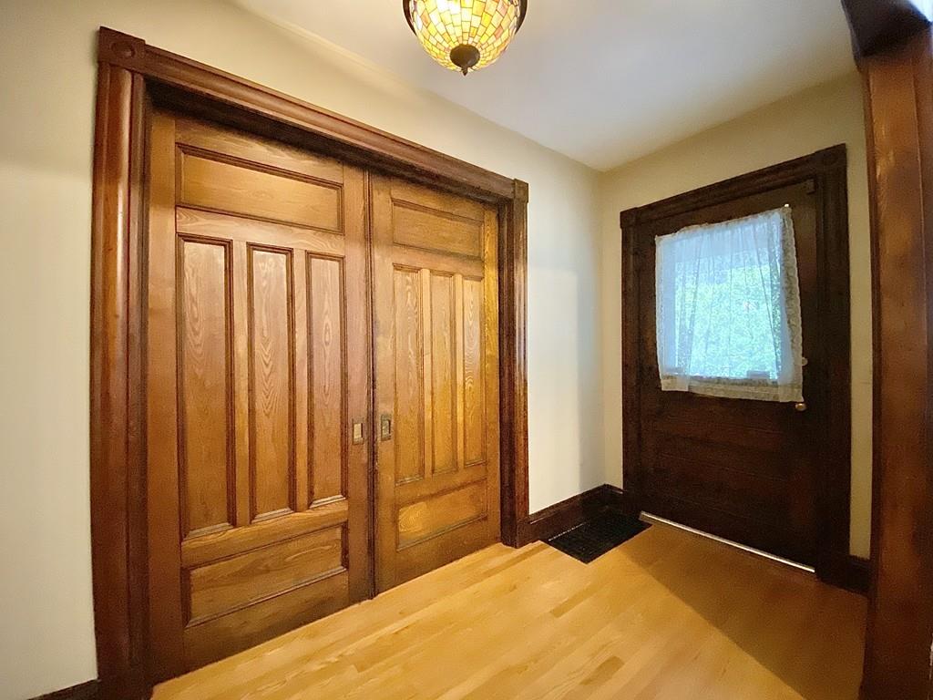 35 Washington Road Springfield, MA 01108 - Photo 7 of 42 a bedroom with a bed and a window