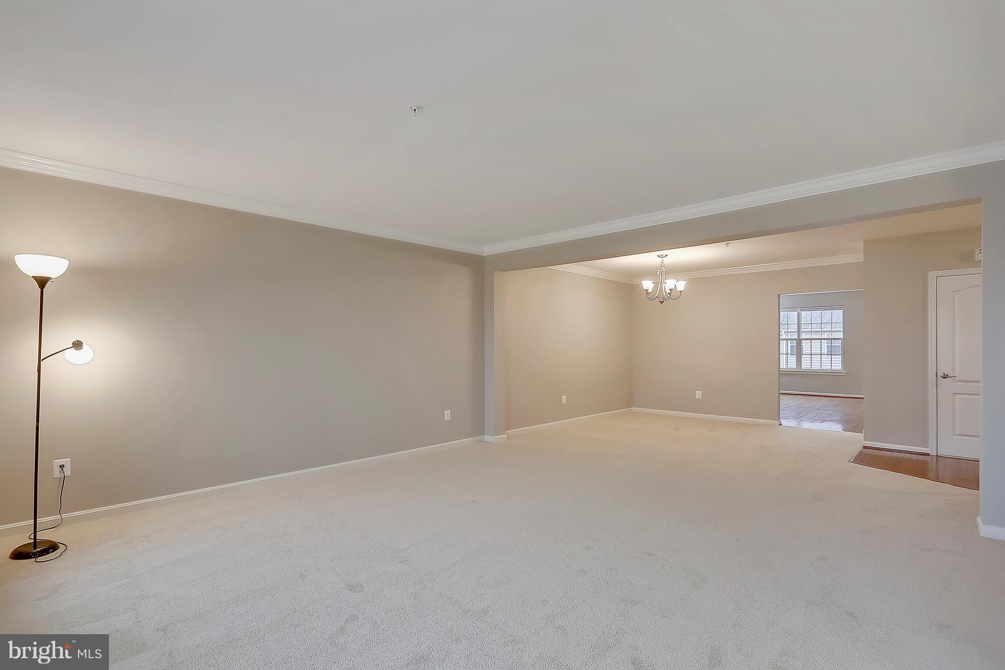 22932 Newcut Road, Unit 2272 Clarksburg, MD 20871 - Photo 11 of 30 Open and expansive living room/dining room area