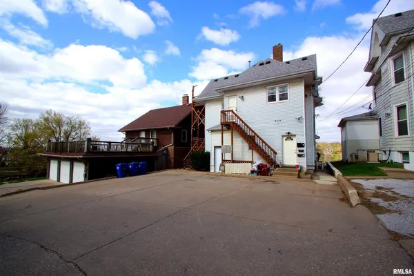 a view of a house with a patio