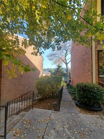 a view of a pathway of a yard