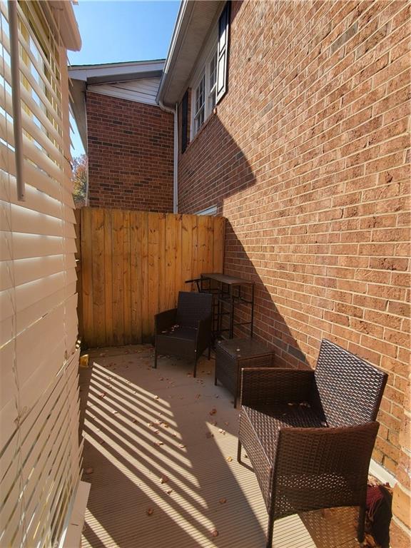 6520 Roswell Road, Unit 59 Atlanta, GA 30328 - Photo 6 of 19 a view of deck with patio