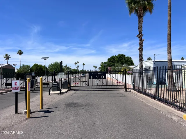 a view of a park with swings