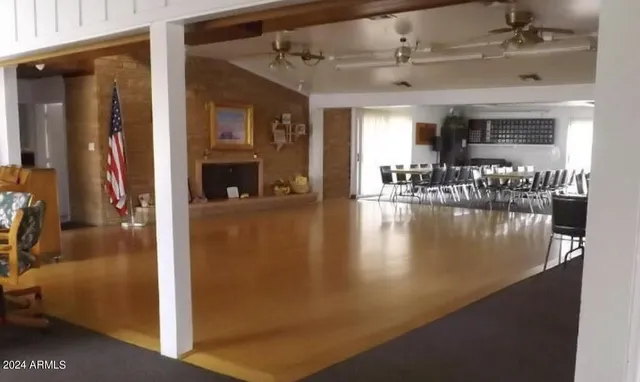a view of a living room and chandelier