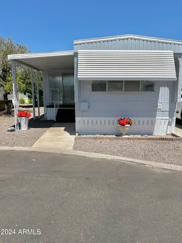 a view of a house with a garage