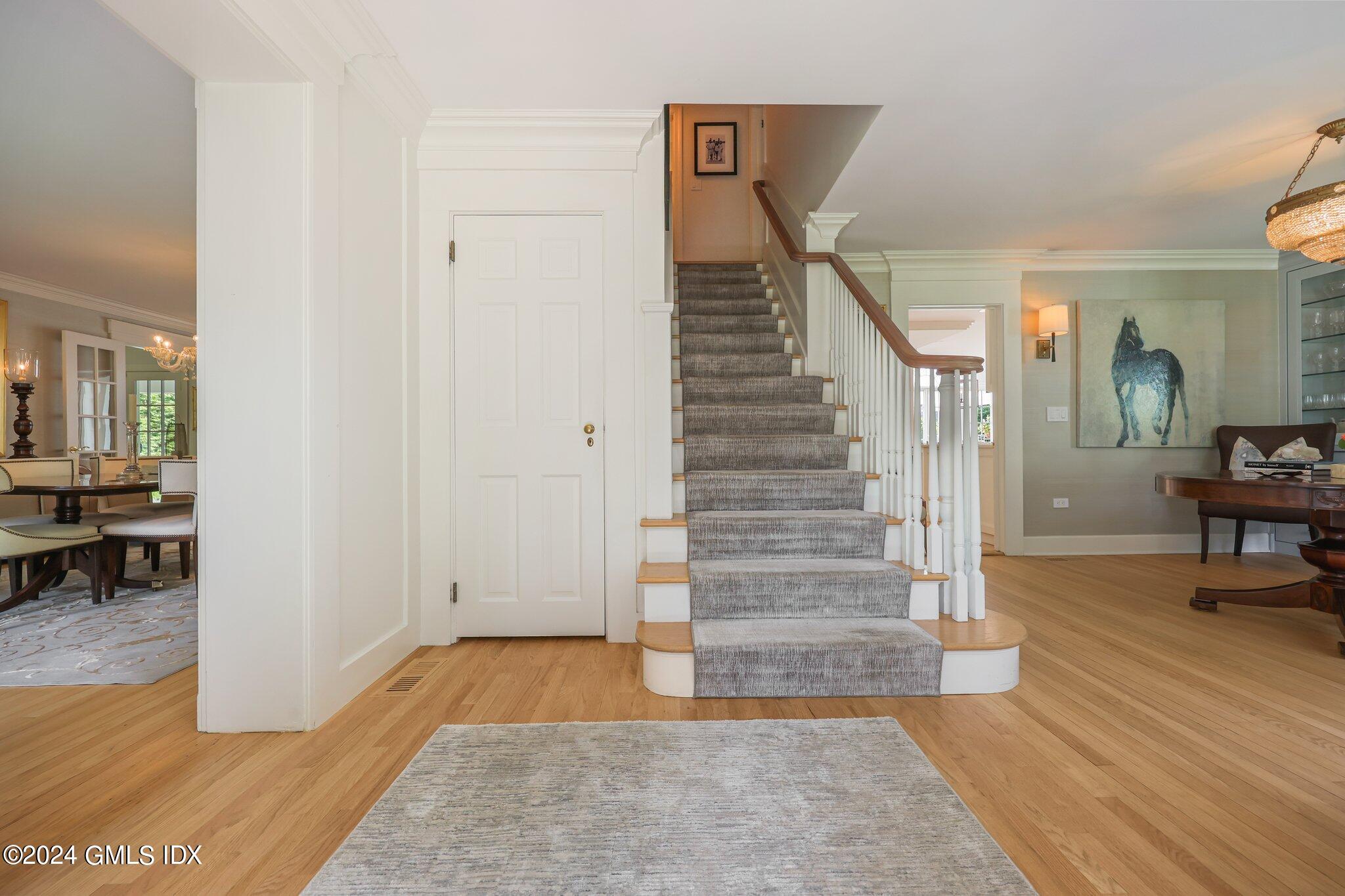 16 Wesskum Wood Road Riverside, CT 06878 - Photo 2 of 37 a view of entryway and hall with wooden floor