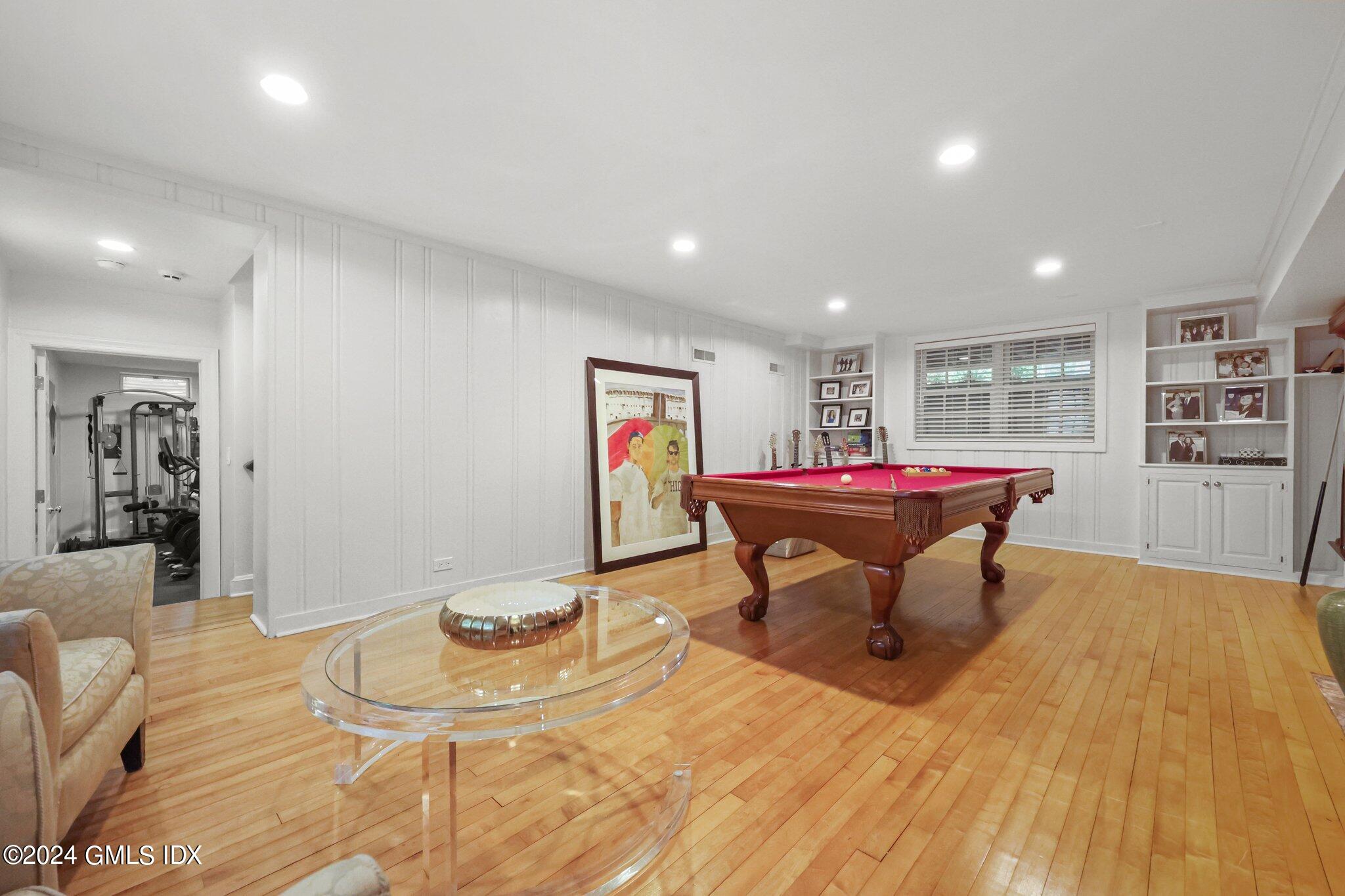 16 Wesskum Wood Road Riverside, CT 06878 - Photo 24 of 37 a workspace with furniture and wooden floor