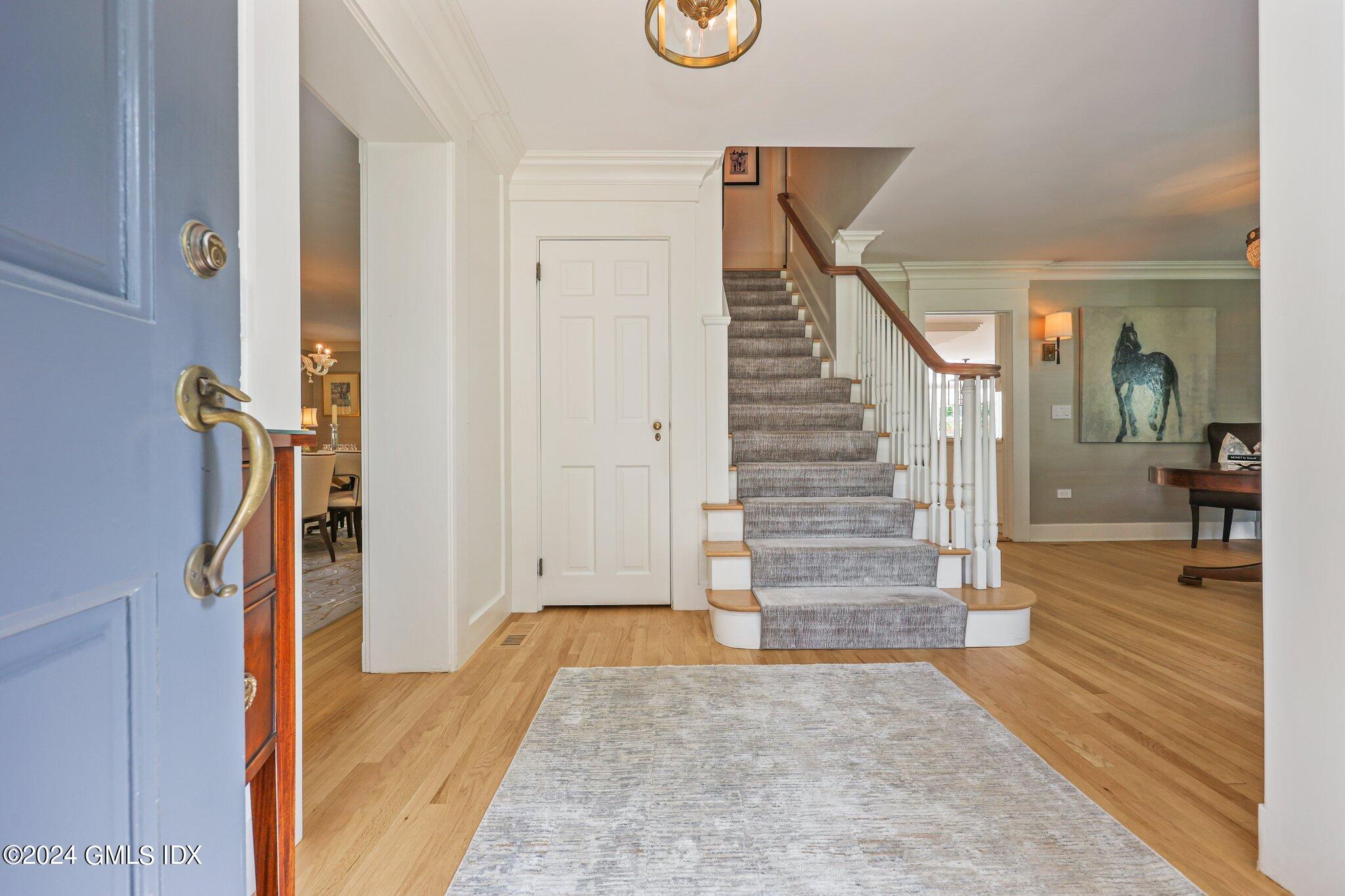 16 Wesskum Wood Road Riverside, CT 06878 - Photo 3 of 37 a view of entryway and hall with wooden floor