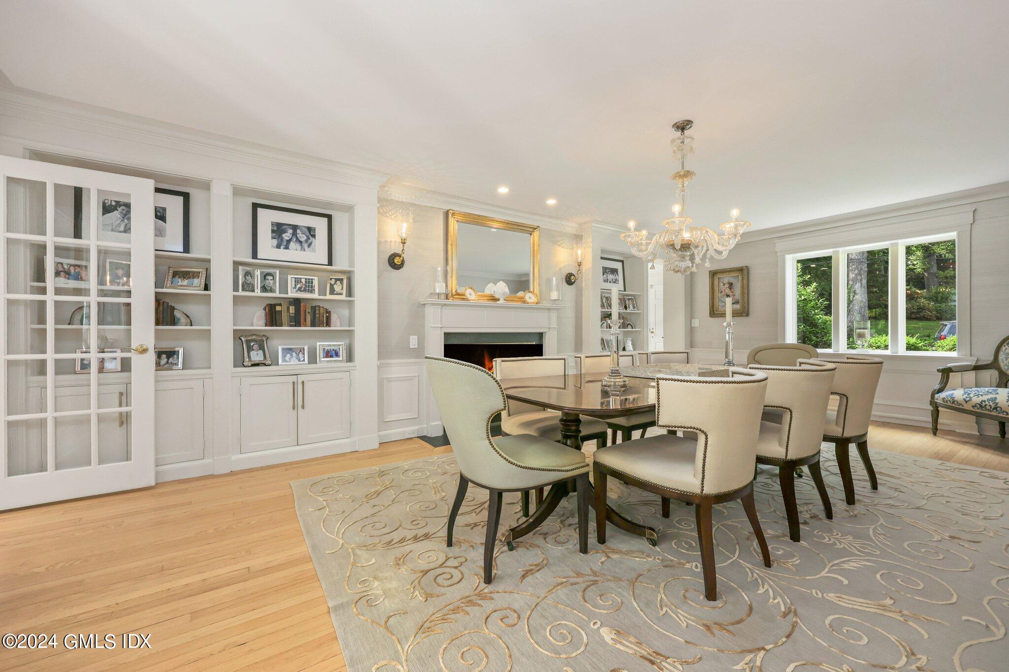 16 Wesskum Wood Road Riverside, CT 06878 - Photo 8 of 37 a view of a dining room with furniture and wooden floor