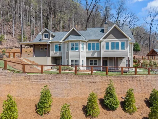 a front view of a house with swimming pool