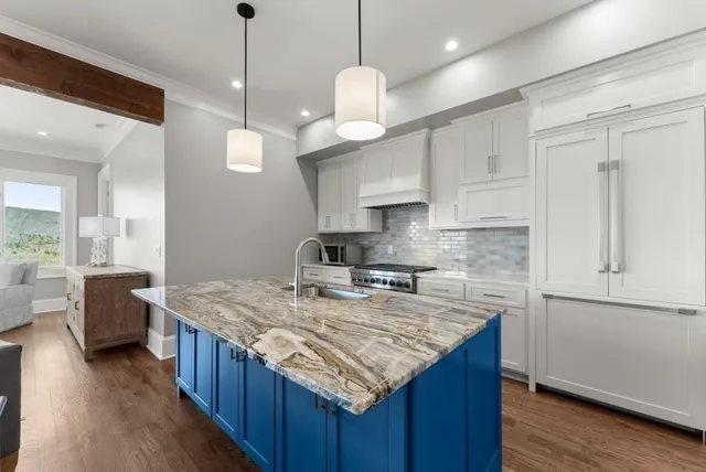 a white bath tub sitting in a bathroom