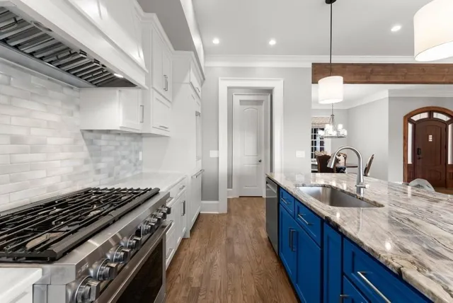 a white bath tub sitting in a bathroom