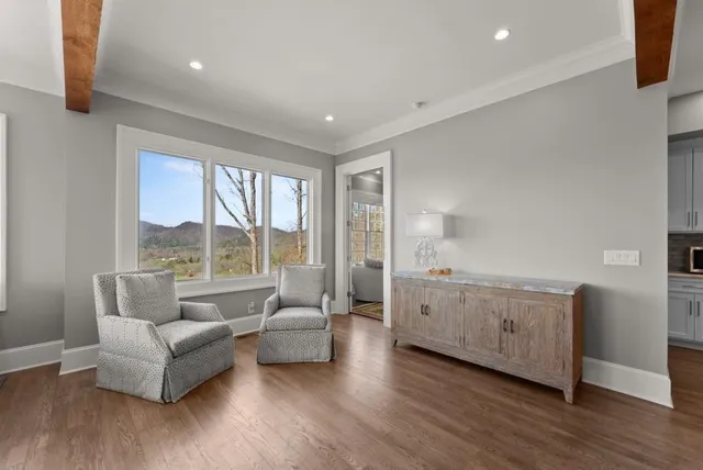 a bathroom with a granite countertop sink mirror and vanity