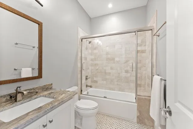 a view of a house with roof deck and sitting area