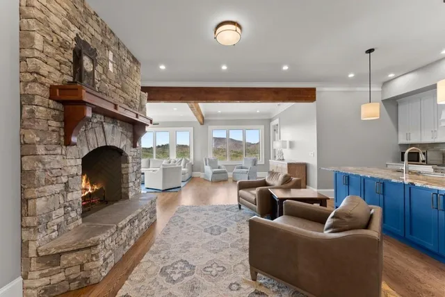 a kitchen with granite countertop a stove and a sink
