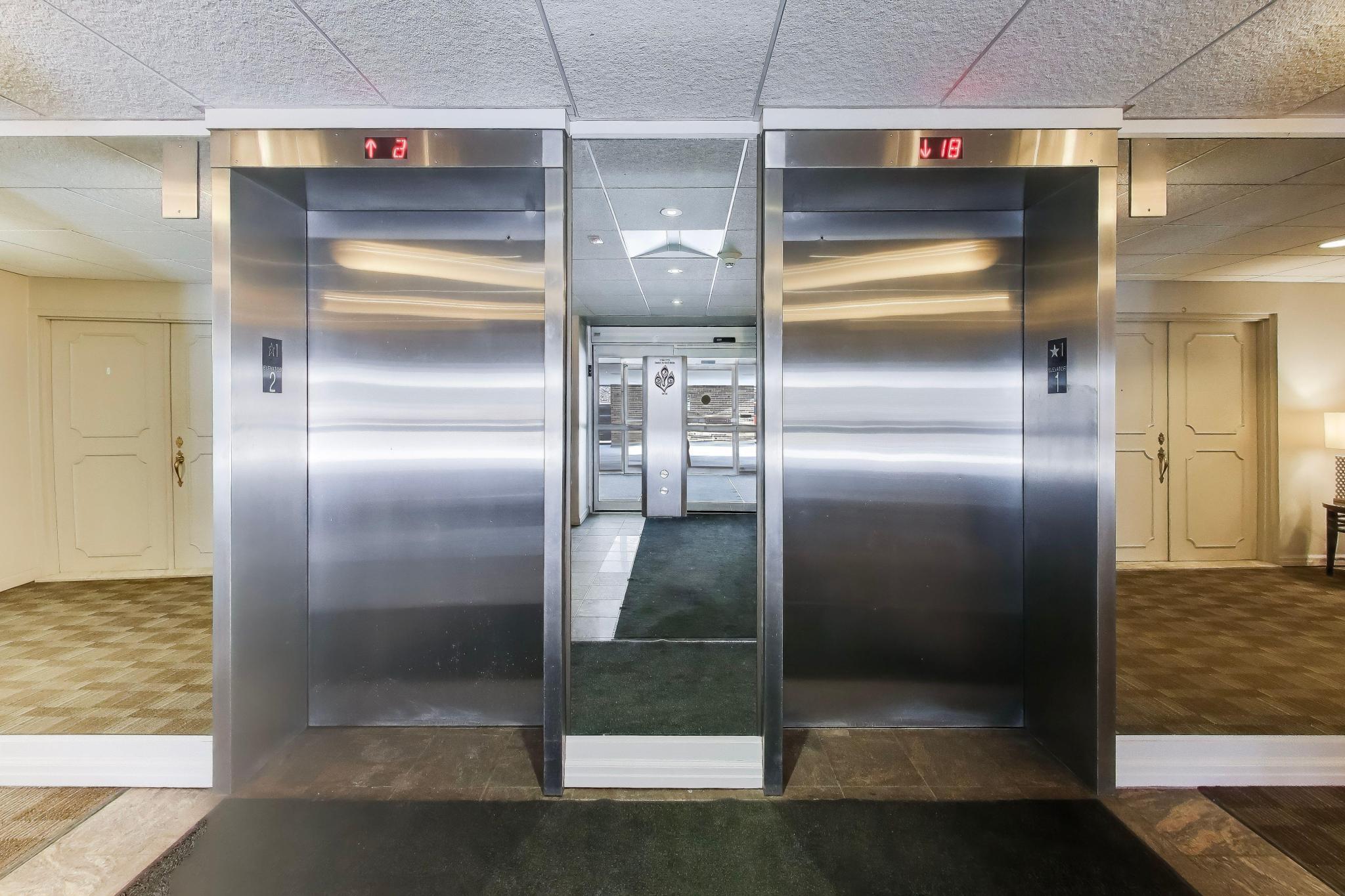 2525 South Shore Drive, Unit 20D Milwaukee, WI 53207 - Photo 31 of 39 Building Elevators