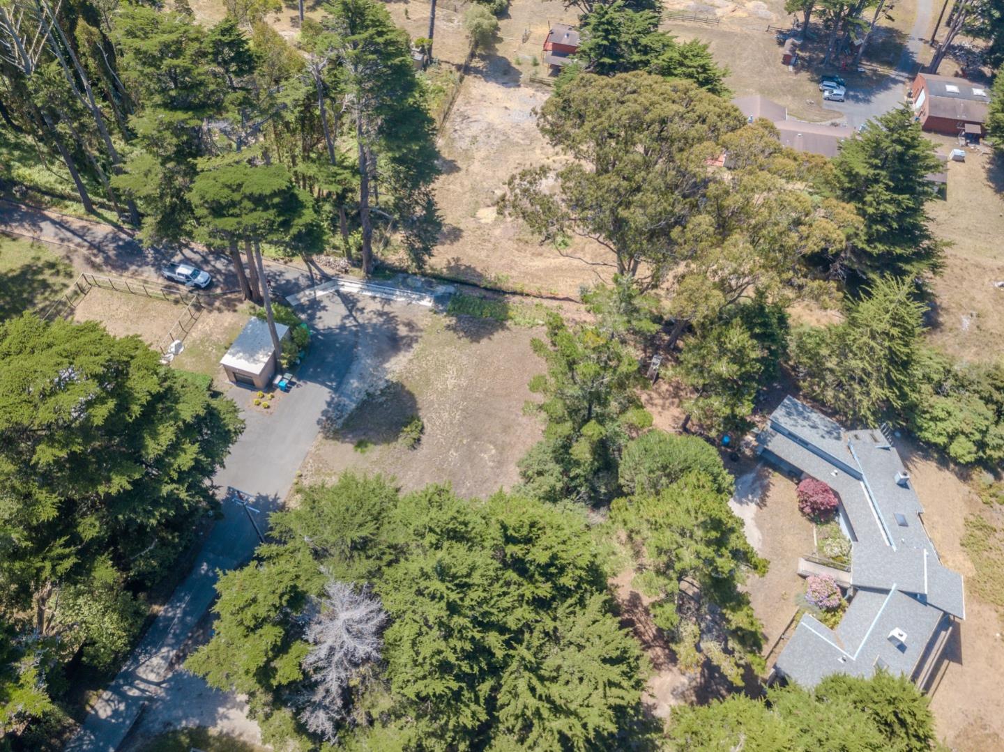 End Of End Of Hermosa Road Montara, CA 94037 - Photo 8 of 16 an aerial view of residential house with outdoor space and trees all around