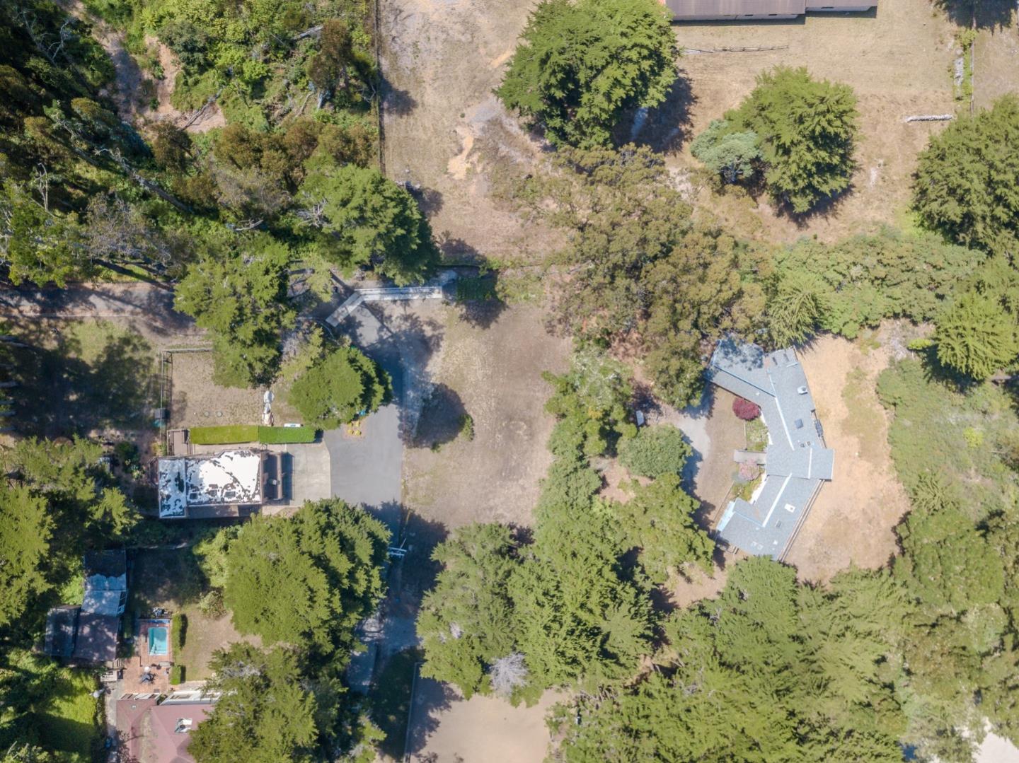 End Of End Of Hermosa Road Montara, CA 94037 - Photo 9 of 16 an aerial view of a house with a yard