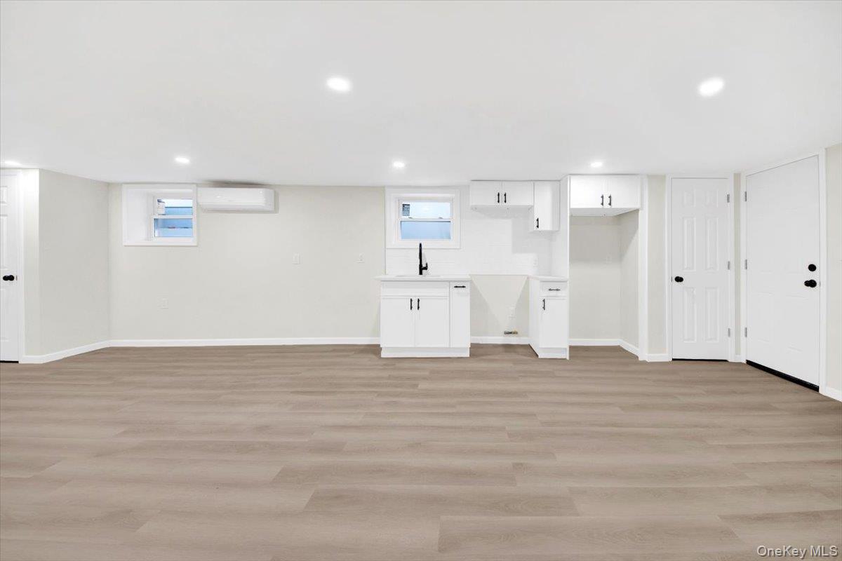 1625 Overing Street Bronx, NY 10461 - Photo 18 of 25 a view of a livingroom with wooden floor