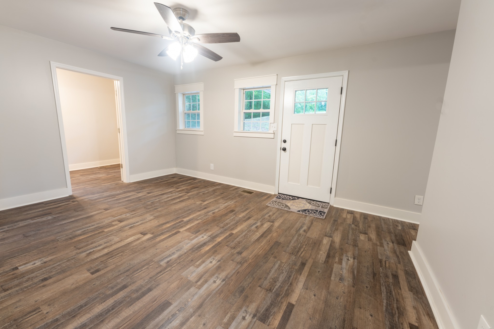 121 Smith Road Winchester, TN 37398 - Photo 18 of 31 wooden floor in an empty room with a window