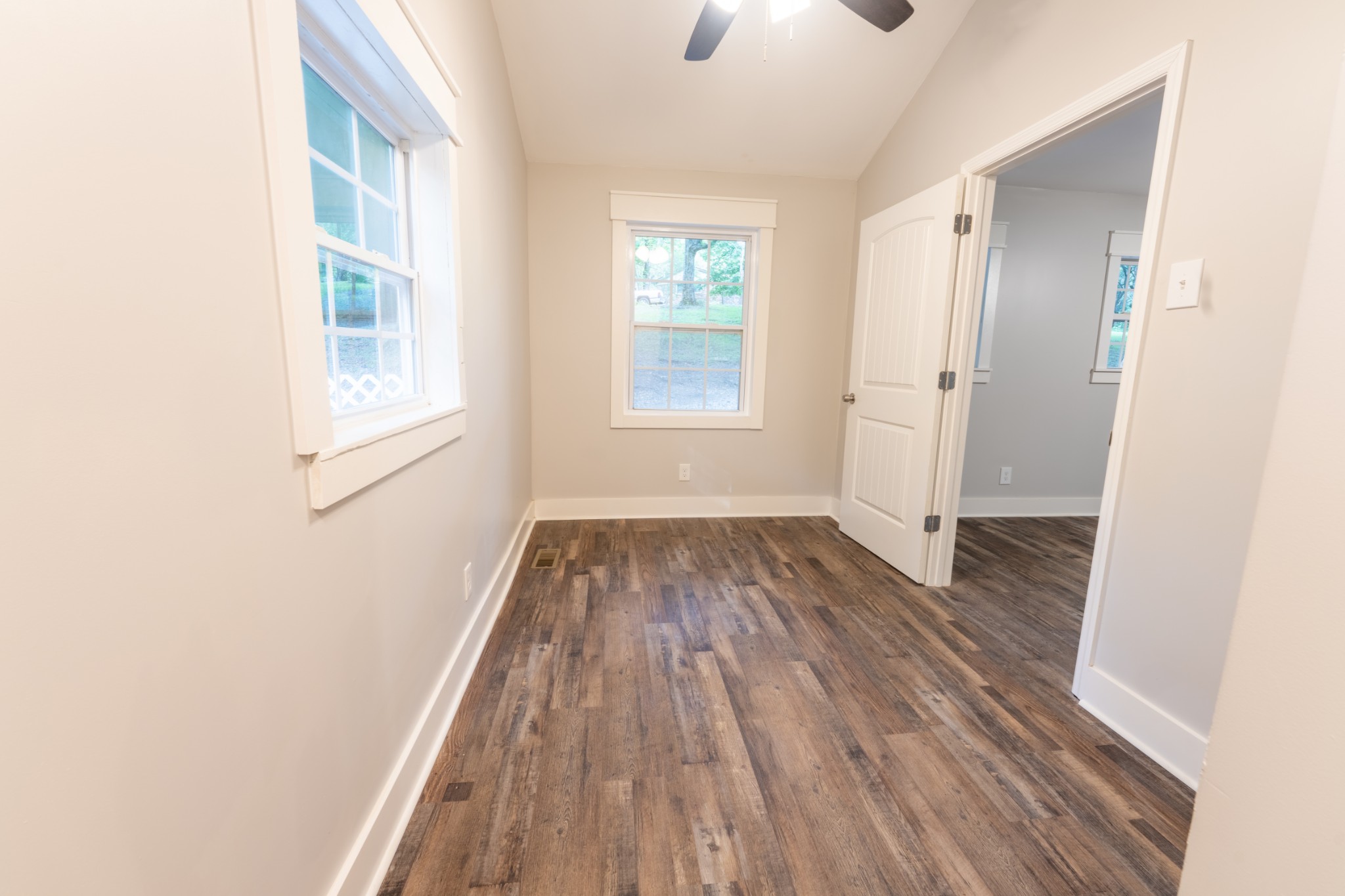121 Smith Road Winchester, TN 37398 - Photo 23 of 31 an empty room with wooden floor and windows
