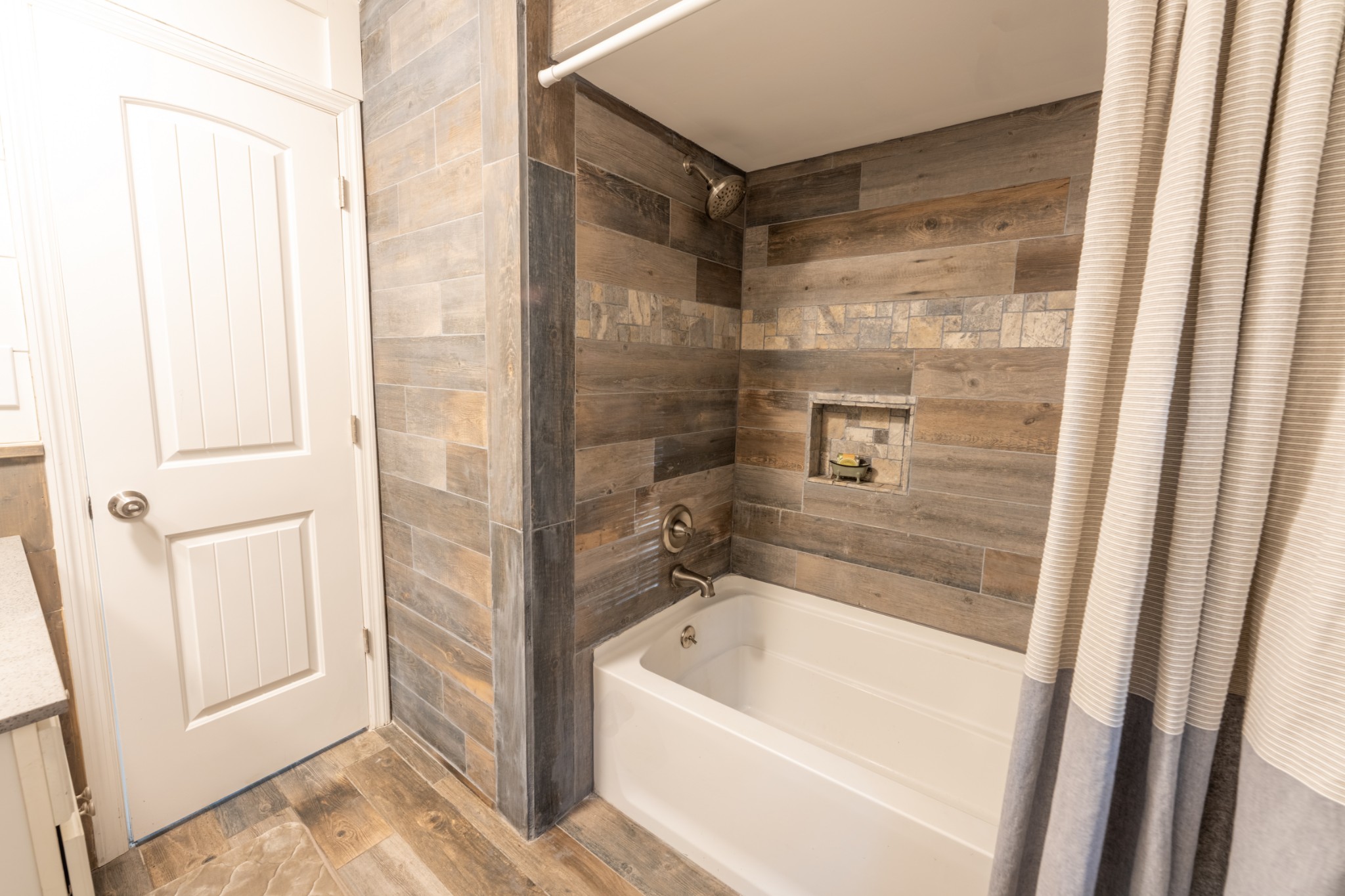 121 Smith Road Winchester, TN 37398 - Photo 26 of 31 a bathroom with a bathtub and a shower