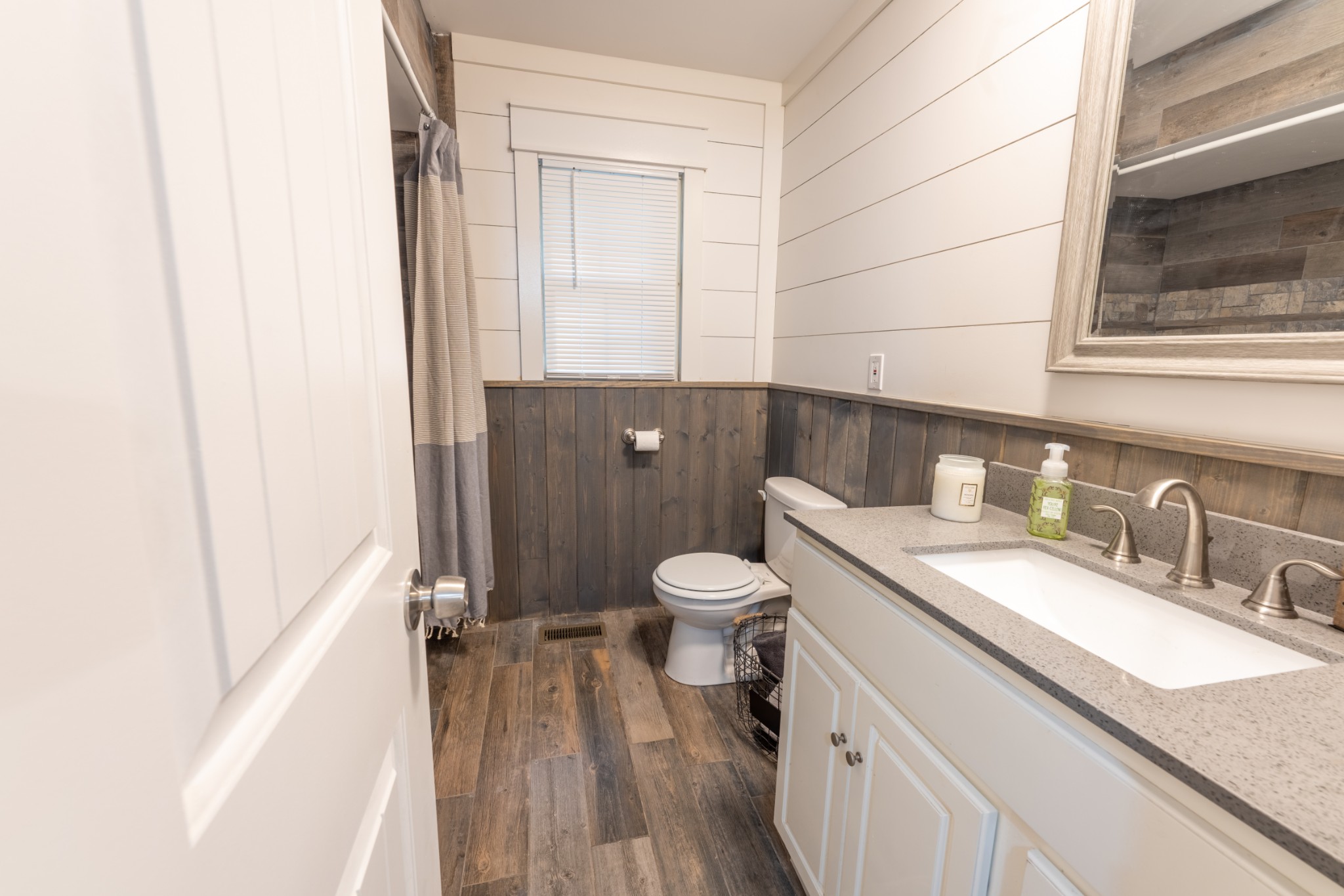 121 Smith Road Winchester, TN 37398 - Photo 27 of 31 a bathroom with a granite countertop sink toilet and shower