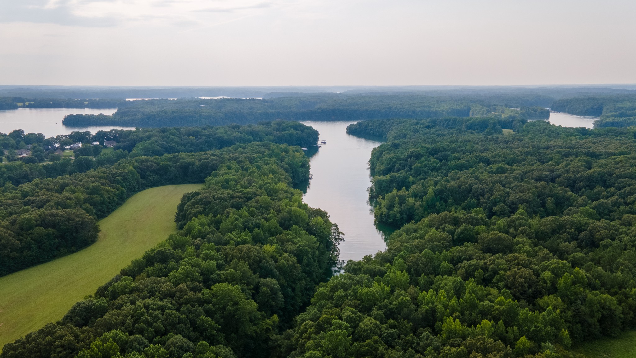 121 Smith Road Winchester, TN 37398 - Photo 4 of 31 an aerial view of a house with a garden and lake view