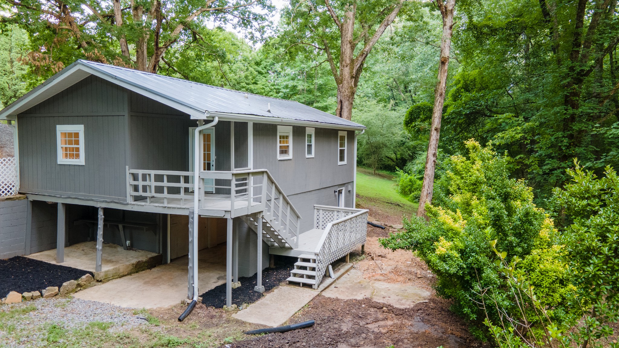121 Smith Road Winchester, TN 37398 - Photo 9 of 31 a house with trees in the background