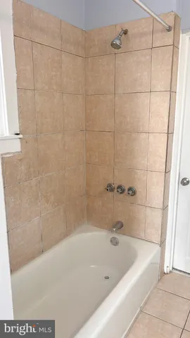 a bathroom with a bathtub