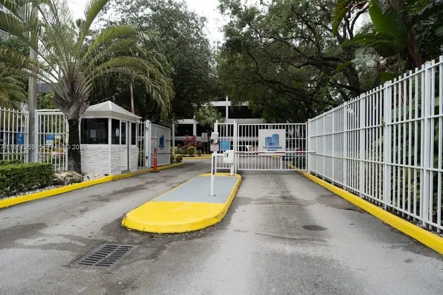swimming pool view with a seating space and a garden view
