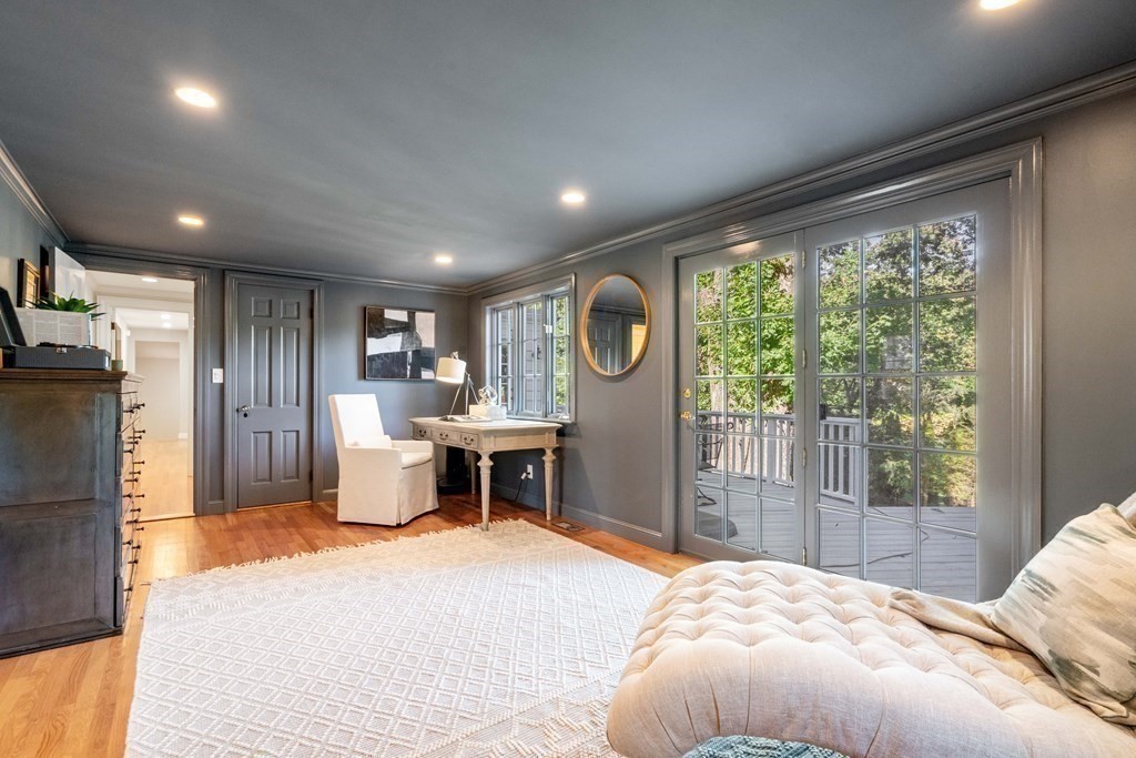 91 Old Colony Road Wellesley, MA 02481 - Photo 13 of 35 a bedroom with a bed and a large window