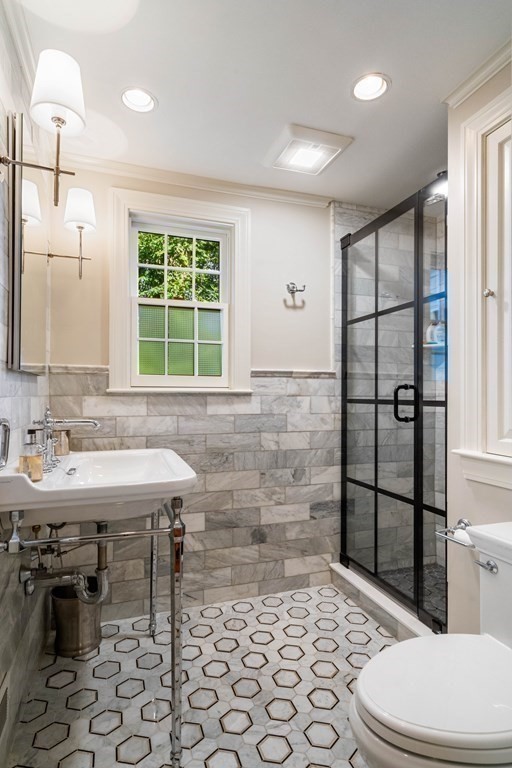 91 Old Colony Road Wellesley, MA 02481 - Photo 14 of 35 a bathroom with a sink a toilet and shower