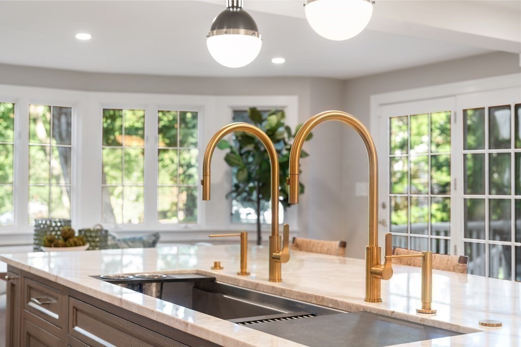 91 Old Colony Road Wellesley, MA 02481 - Photo 15 of 35 a kitchen with a large window and a sink