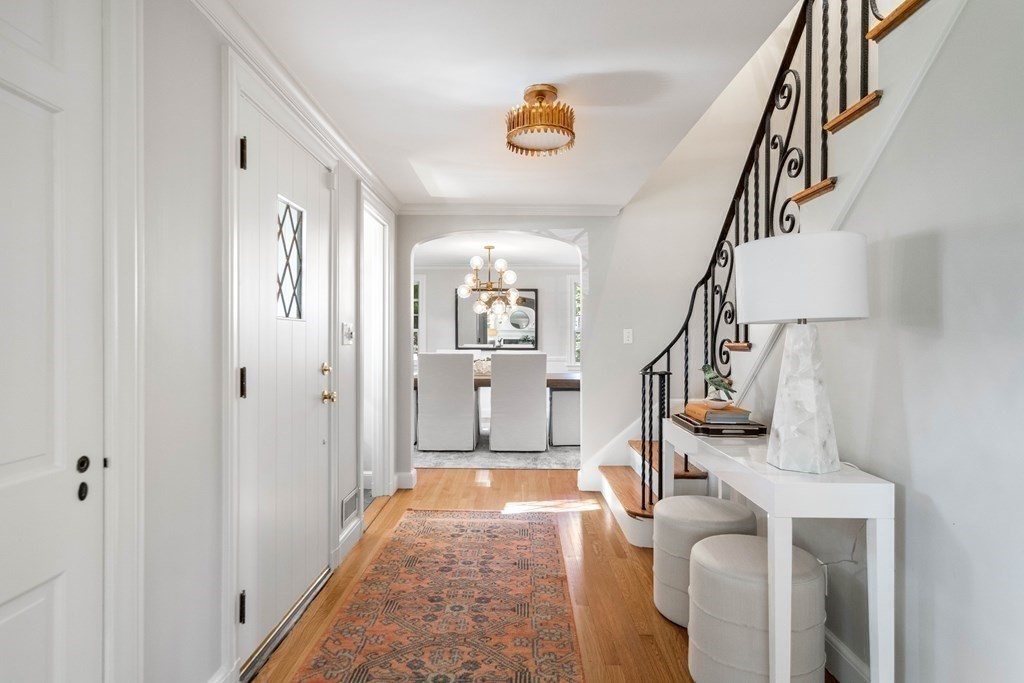 91 Old Colony Road Wellesley, MA 02481 - Photo 4 of 35 a view of entryway and hall with wooden floor