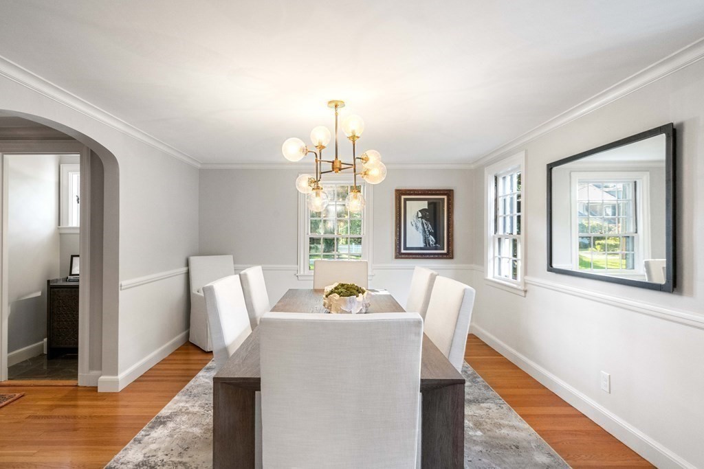 91 Old Colony Road Wellesley, MA 02481 - Photo 9 of 35 a living room with furniture and a chandelier