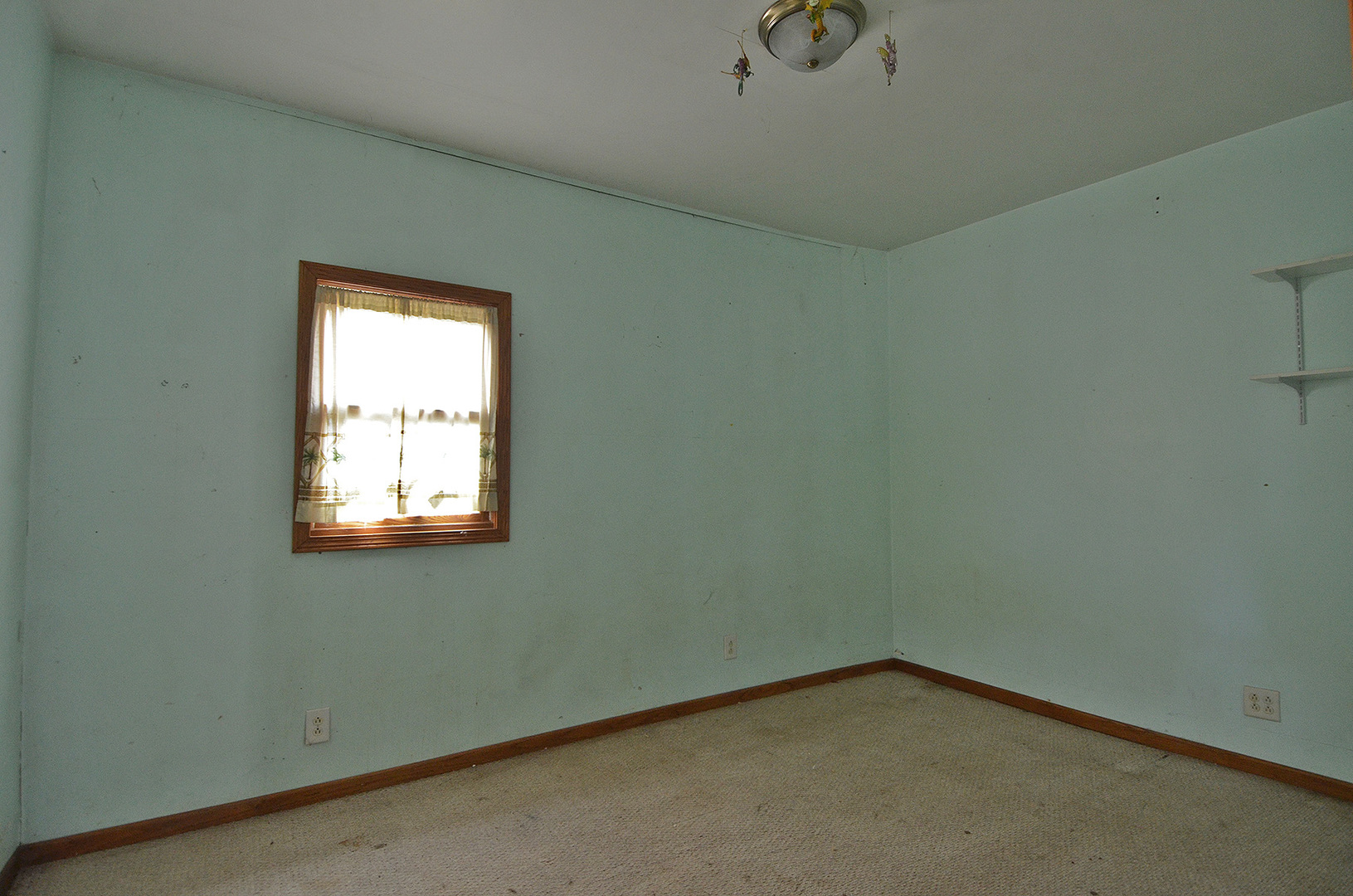 266 Clark Street Marseilles, IL 61341 - Photo 9 of 12 an empty room with a window