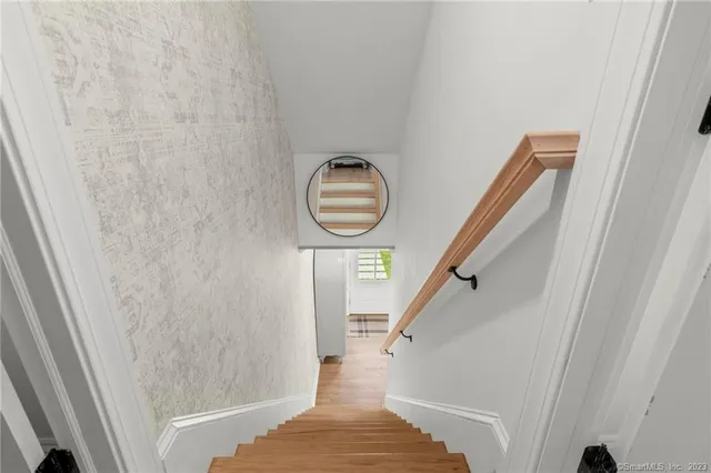 a view of entryway with wooden floor