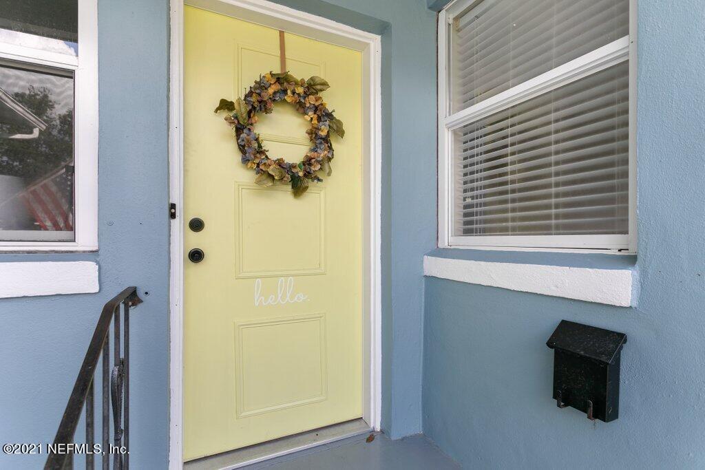 1642 Clemson Road Jacksonville, FL 32217 - Photo 3 of 35 a view of a closet and window in a room