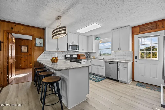 $795,000 | 142 Greensboro Street, Holden Beach, NC 28462