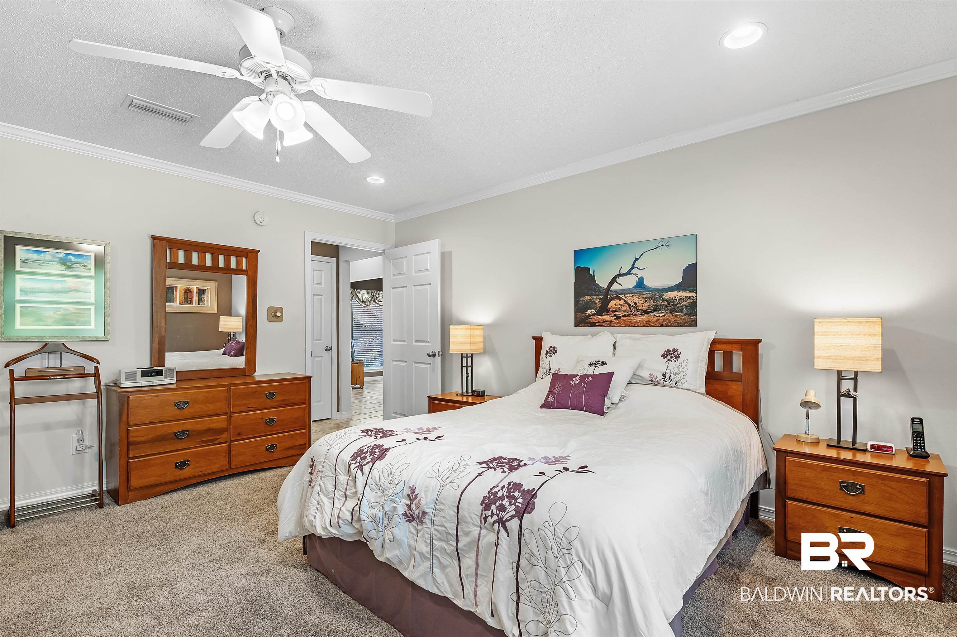 9908 Clarke Ridge Road Foley, AL 36535 - Photo 39 of 56 Carpeted bedroom with a ceiling fan, recessed lighting, ornamental molding, and visible vents