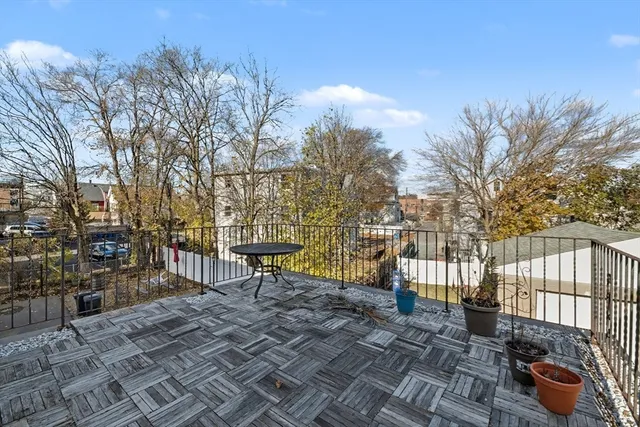 a view of a bench in a backyard