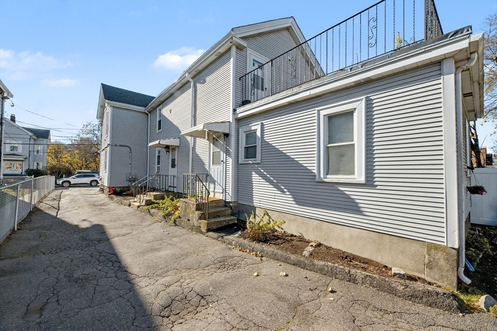 46 Waverly Street, Unit 2 Boston, MA 02135 - Photo 14 of 18 a backyard of a house
