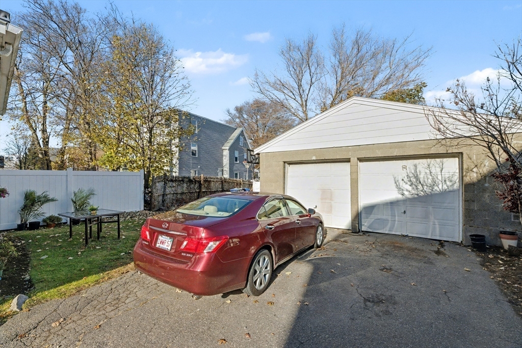 46 Waverly Street, Unit 2 Boston, MA 02135 - Photo 15 of 18 a front view of a house with garden
