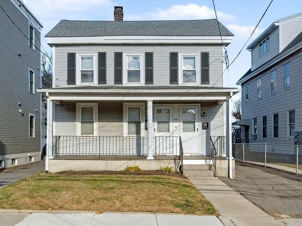 46 Waverly Street, Unit 2 Boston, MA 02135 - Photo 18 of 18 a front view of a house with a swimming pool