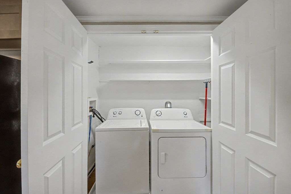 46 Waverly Street, Unit 2 Boston, MA 02135 - Photo 4 of 18 a utility room with dryer and washer