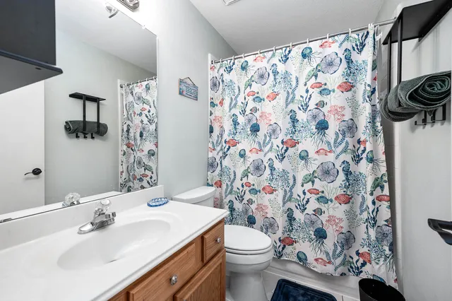 a bathroom with a sink and a toilet
