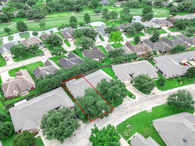 an aerial view of a city with lots of residential buildings