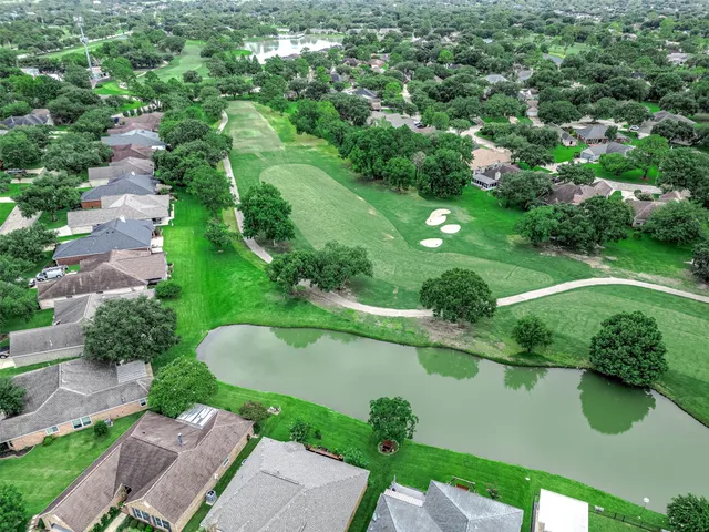 a view of a lake with a yard